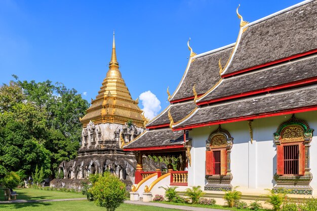 Chapel and golden pagoda at Wat Chiang Man in Chiang Mai North of Thailand