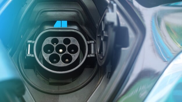 Charging socket of an electric car with blue light