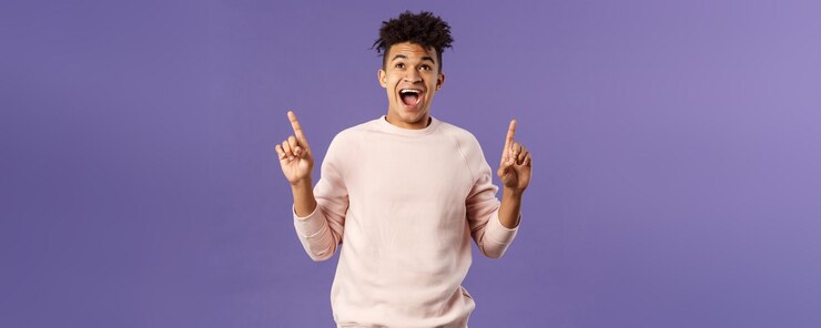 Free Photo charismatic goodlooking young s hispanic guy rejoicing over super cool offer best deal ever seeing f