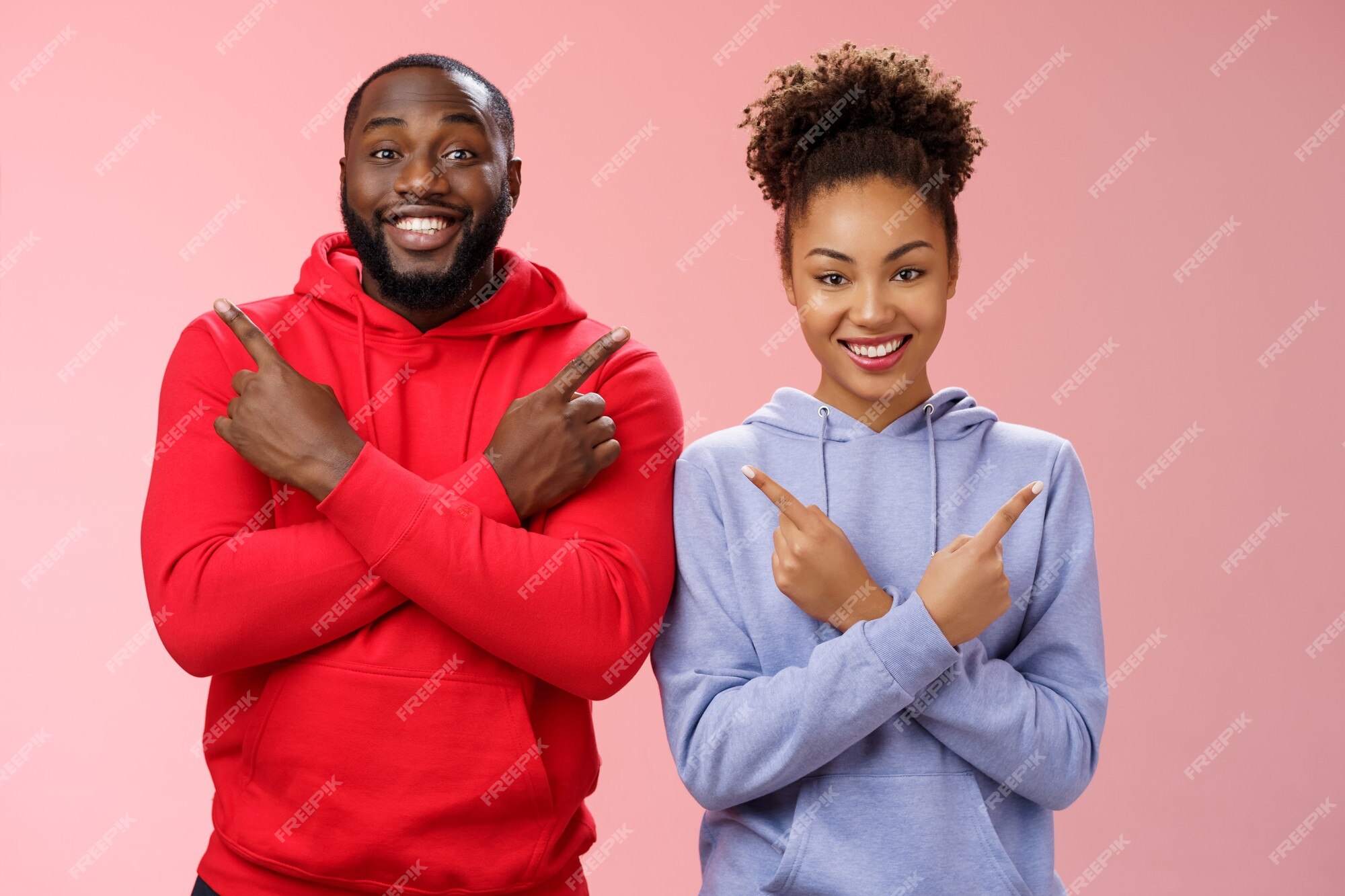 Happy Afro American girlfriend and boyfriend play games on