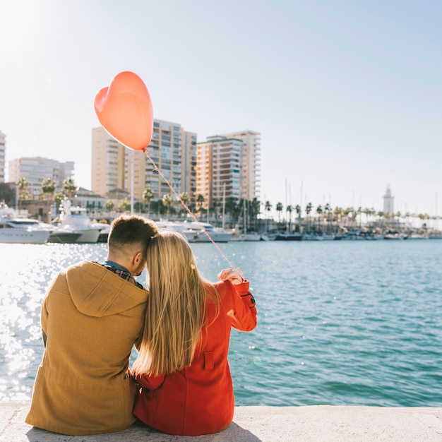 Charming people enjoying day on seafront