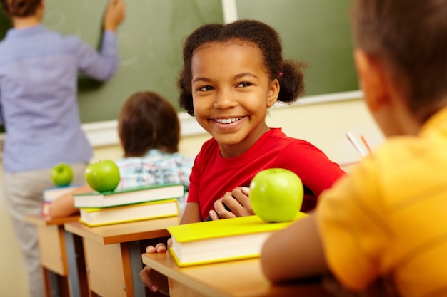 Free photo charming schoolgirl with red t-shirt