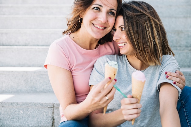 Charming women with ice-cream