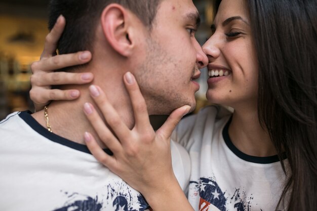 "Charming young couple kissing"