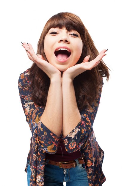 Charming young woman with hands under her chin