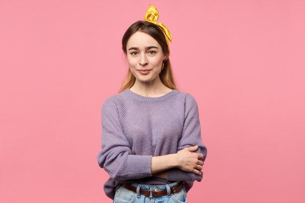 Charming young woman with silk scarf on her head