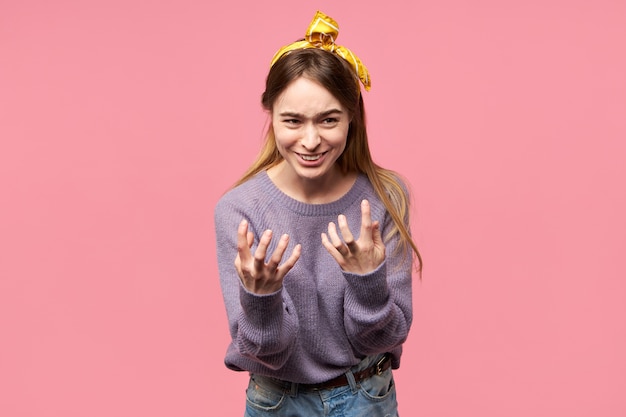 Charming young woman with silk scarf on her head