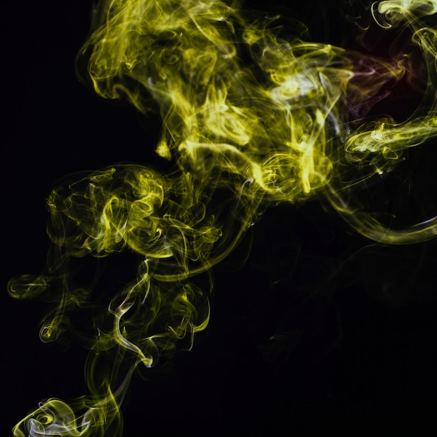 Chartreuse smoke on black background