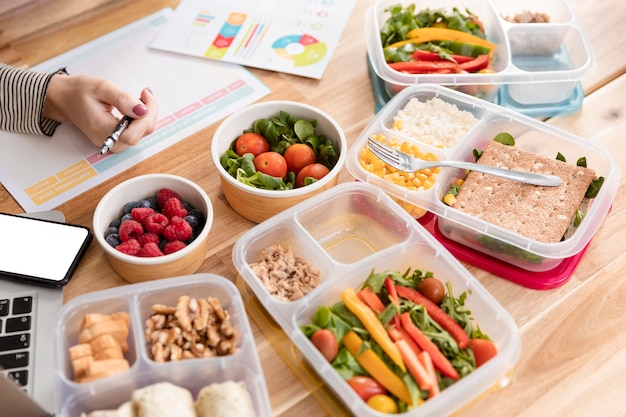 Charts and organic food in lunch boxes