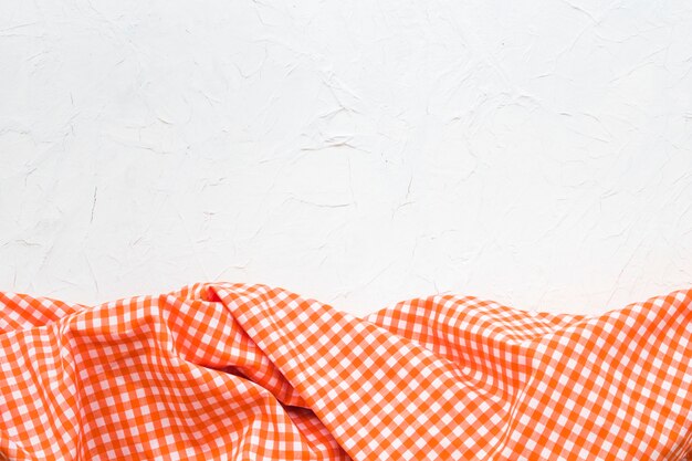 Checkered cloth on white background