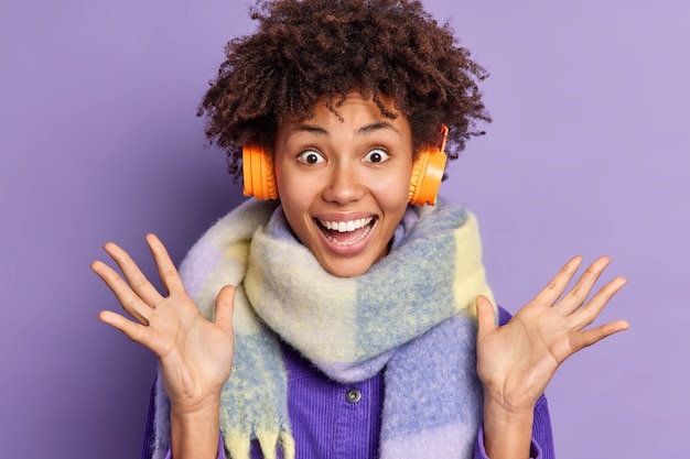 Cheerful Afro American Woman Enjoying Music and Feeling Happy