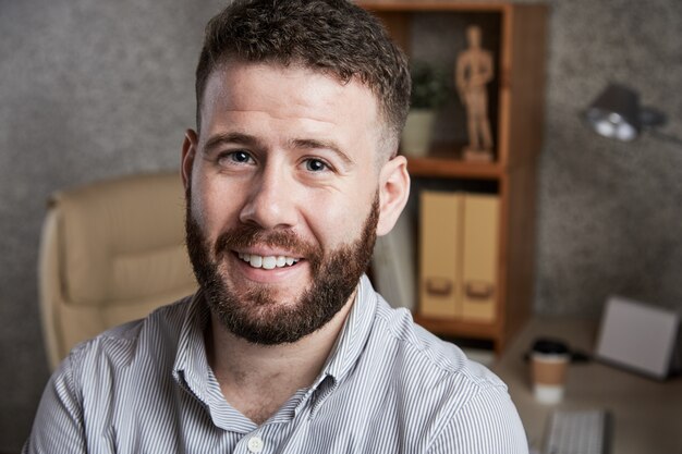 Cheerful bearded man