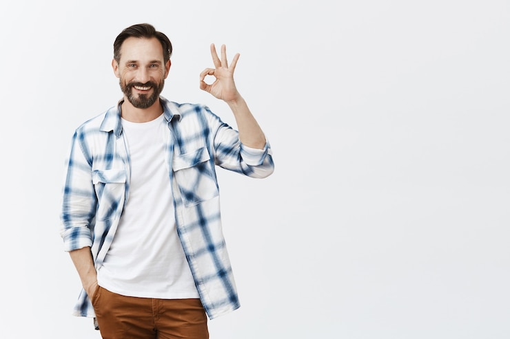 Free Photo cheerful bearded mature man posing