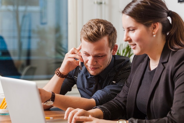 Cheerful business people in office