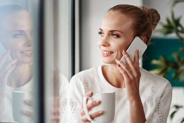 Cheerful businesswoman taking a break