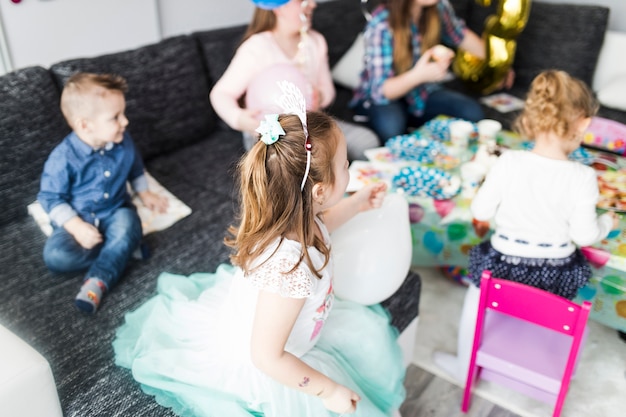 Cheerful children on birthday party