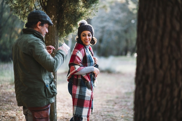 Cheerful couple in forest