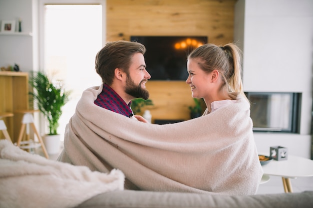 Free photo cheerful couple in plaid