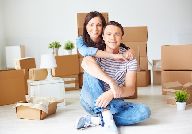 Cheerful couple on their moving day