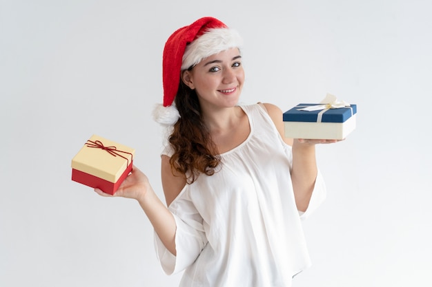 Cheerful cute girl announcing Christmas party