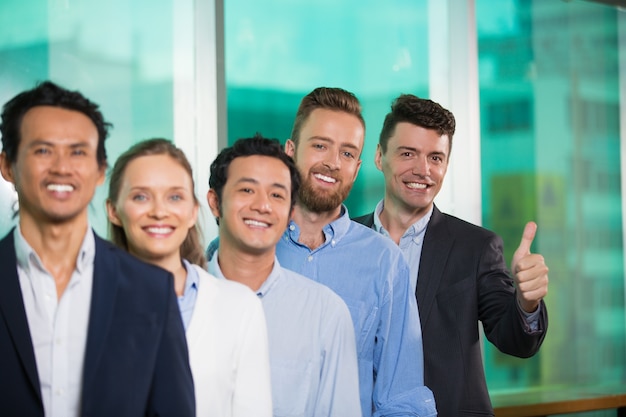 Cheerful Diverse Business People Standing in Row