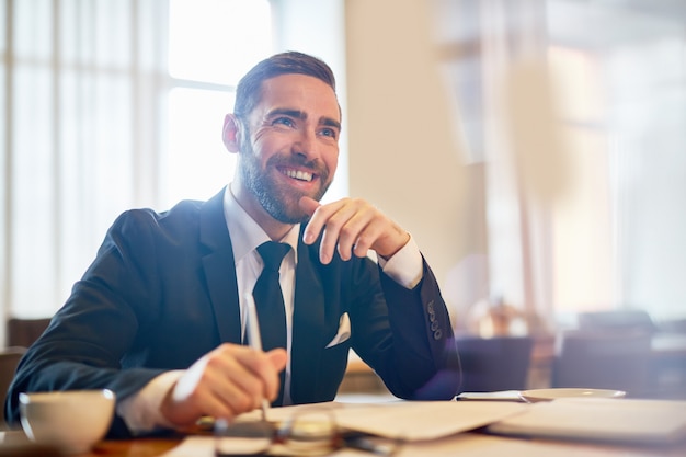 Cheerful Entrepreneur at Workplace