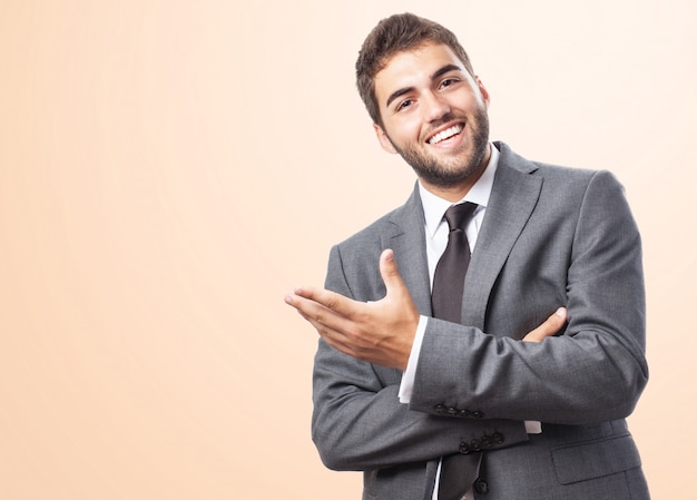 Cheerful executive over pink background