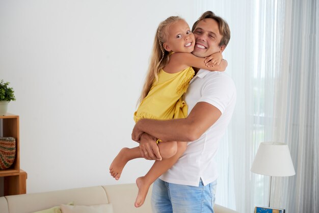 Cheerful father and daughter