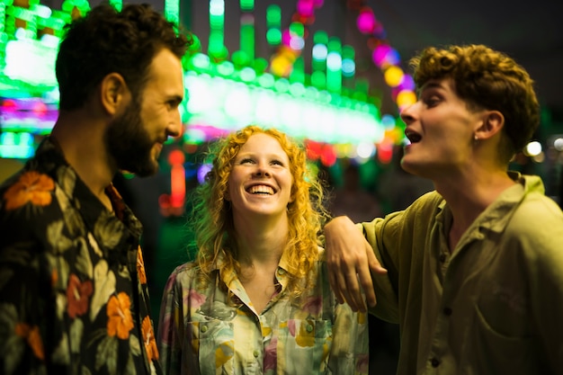 Cheerful friends laughing at each other