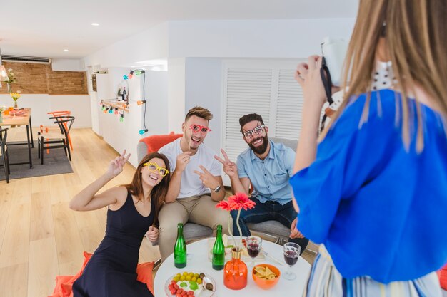 Cheerful friends posing for camera