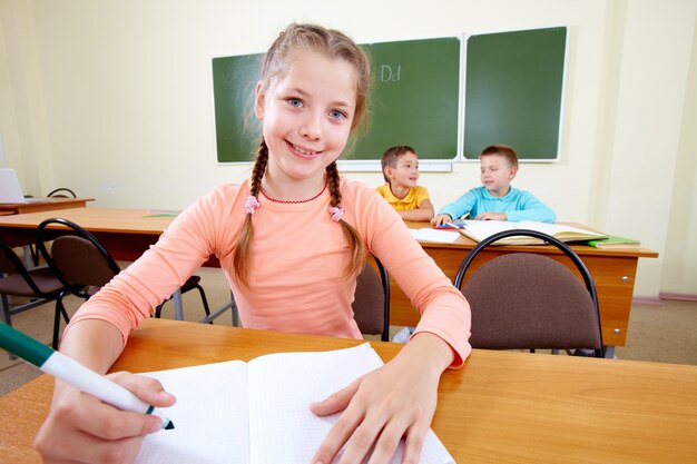 Cheerful girl drawing