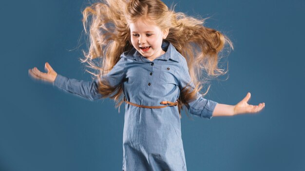 Cheerful girl jumping