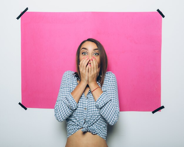 Free photo cheerful girl posing at camera