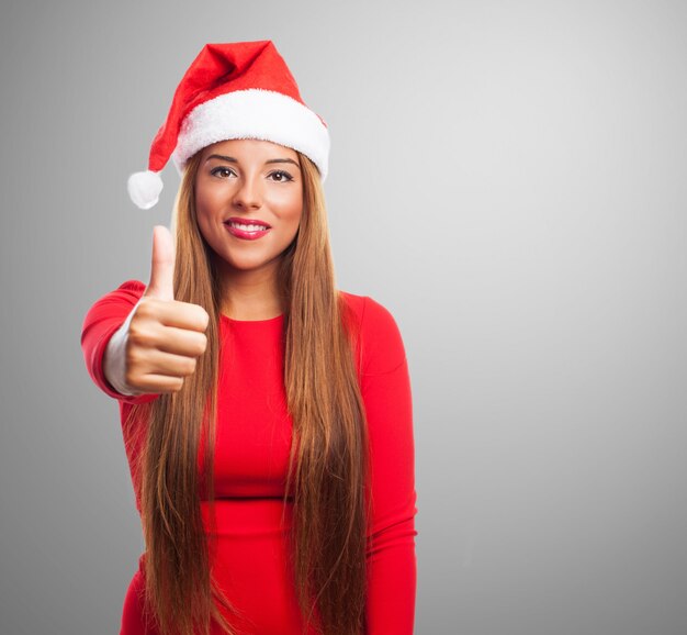 Cheerful girl showing a positive gesture