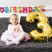 Free photo cheerful girl with balloon