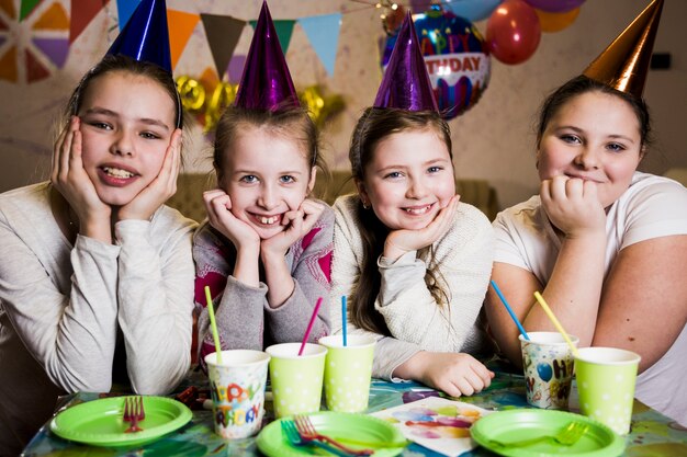 Cheerful girls on birthday party