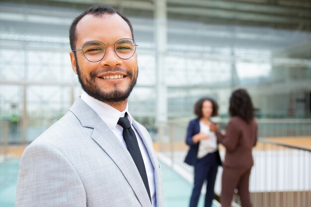 Cheerful handsome businessman