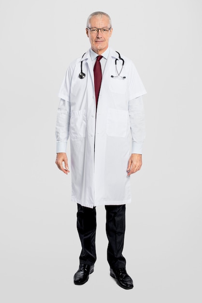 Free photo cheerful male doctor in a white gown full body