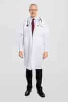Free photo cheerful male doctor in a white gown full body