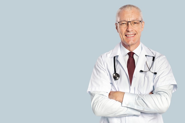 Free photo cheerful male doctor in a white gown portrait