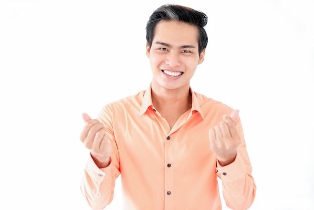 Cheerful man rubbing fingers while asking money