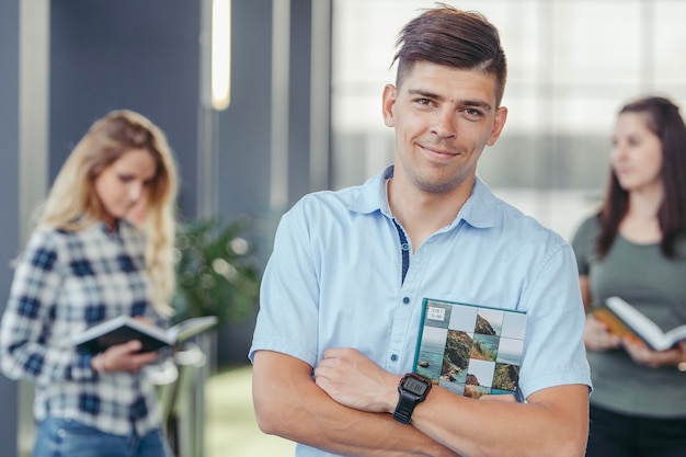 Cheerful man with book