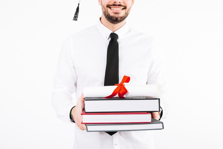 Free Photo cheerful man with diploma and books 