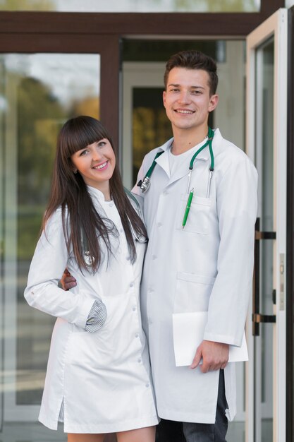 Cheerful medical colleagues at hospital