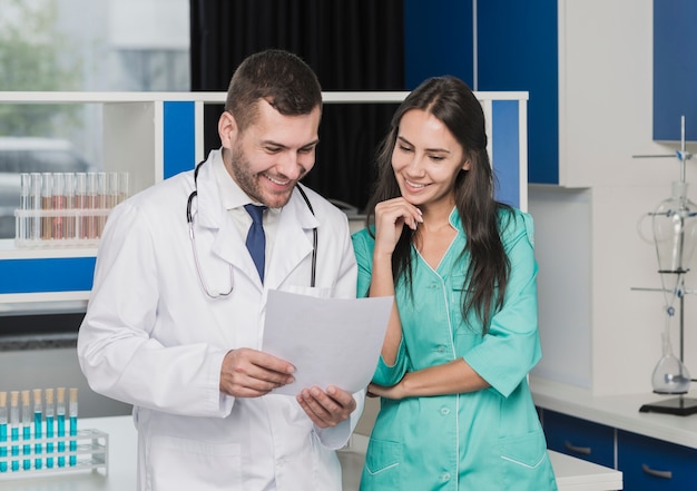 Cheerful medics with documents