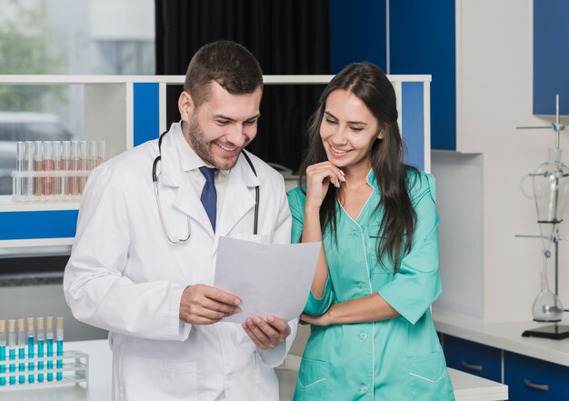 Cheerful medics with documents