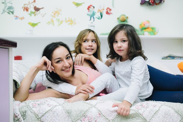 Cheerful mother with children