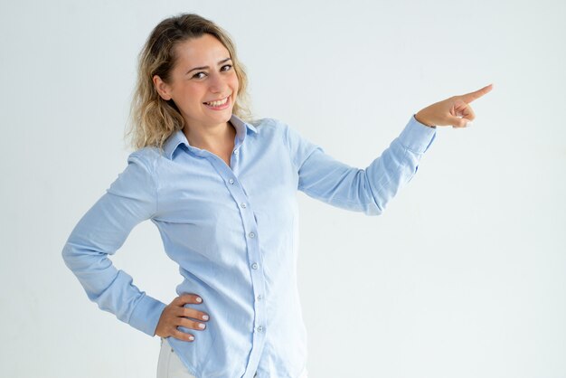 Cheerful office employee presenting news