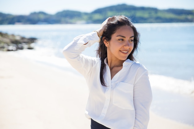 Cheerful office worker starting her vacation