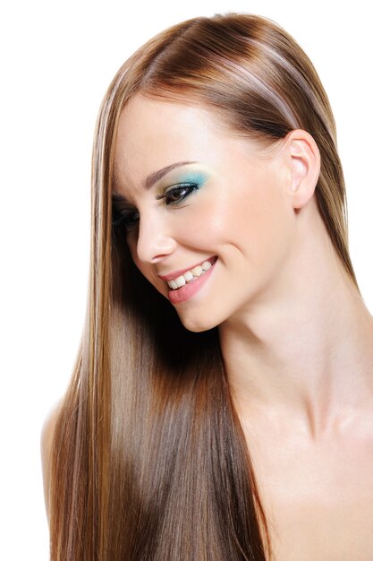 Cheerful pretty beautiful girl with health gloss hair - isolated